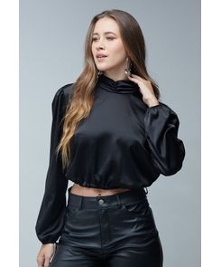 Blusa manga larga cuello alto recogido en puños