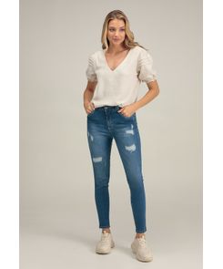 Jean reductor tiro alto con desgastes bota tubo