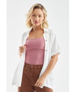 Blusa manga corta con bolsillos en frente oversize