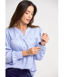 Blusa manga larga con cuello nerú y perilla interrumpida