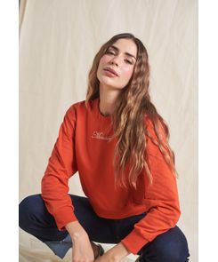 Buzo rojo con bordado para mujeres